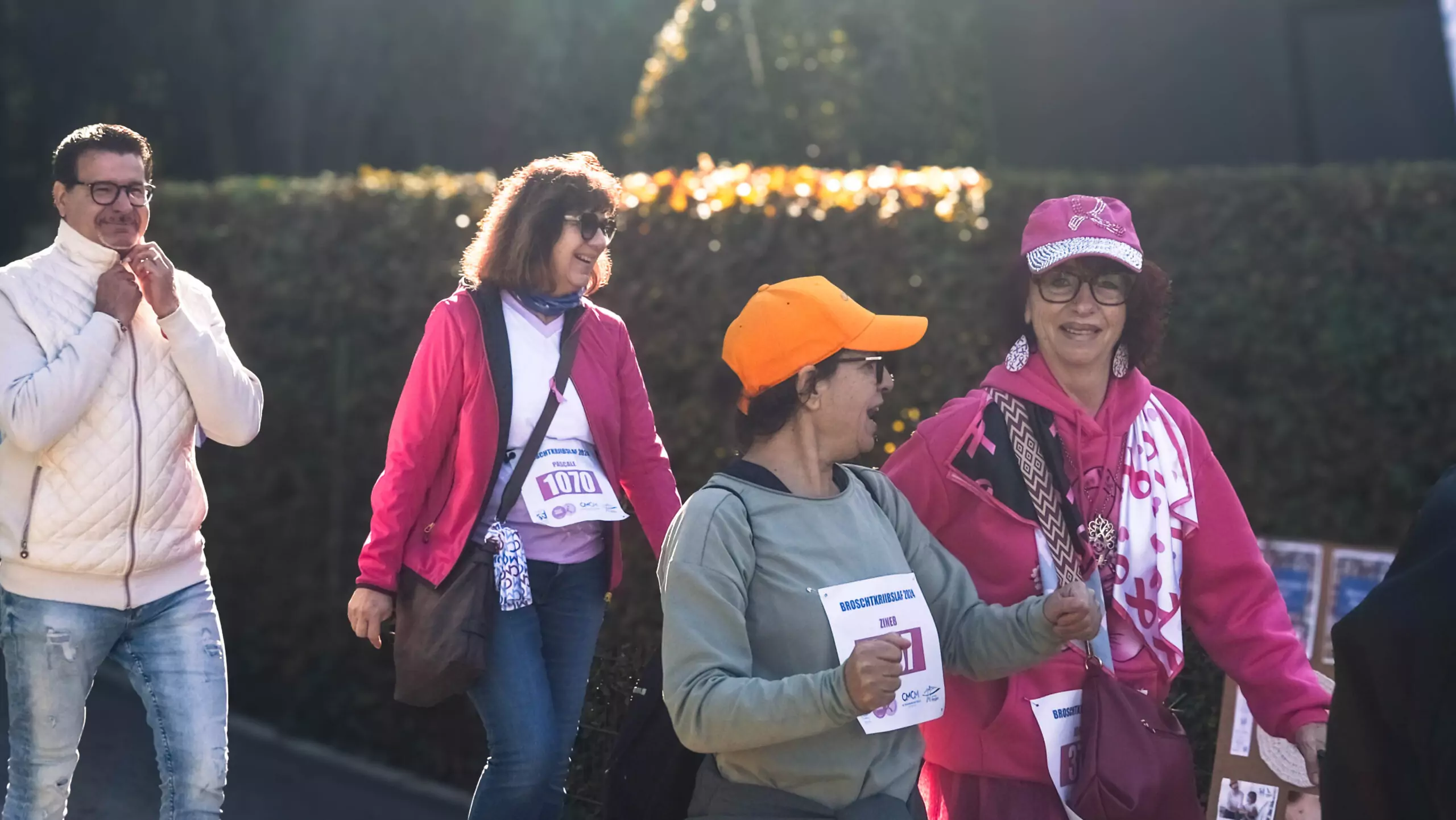 A group of ALGSO members smiling and chatting as they cross the finish line of the Broschtkriibslaf 2024 A group of ALGSO members smiling and chatting as they cross the finish line of the Broschtkriibslaf 2024