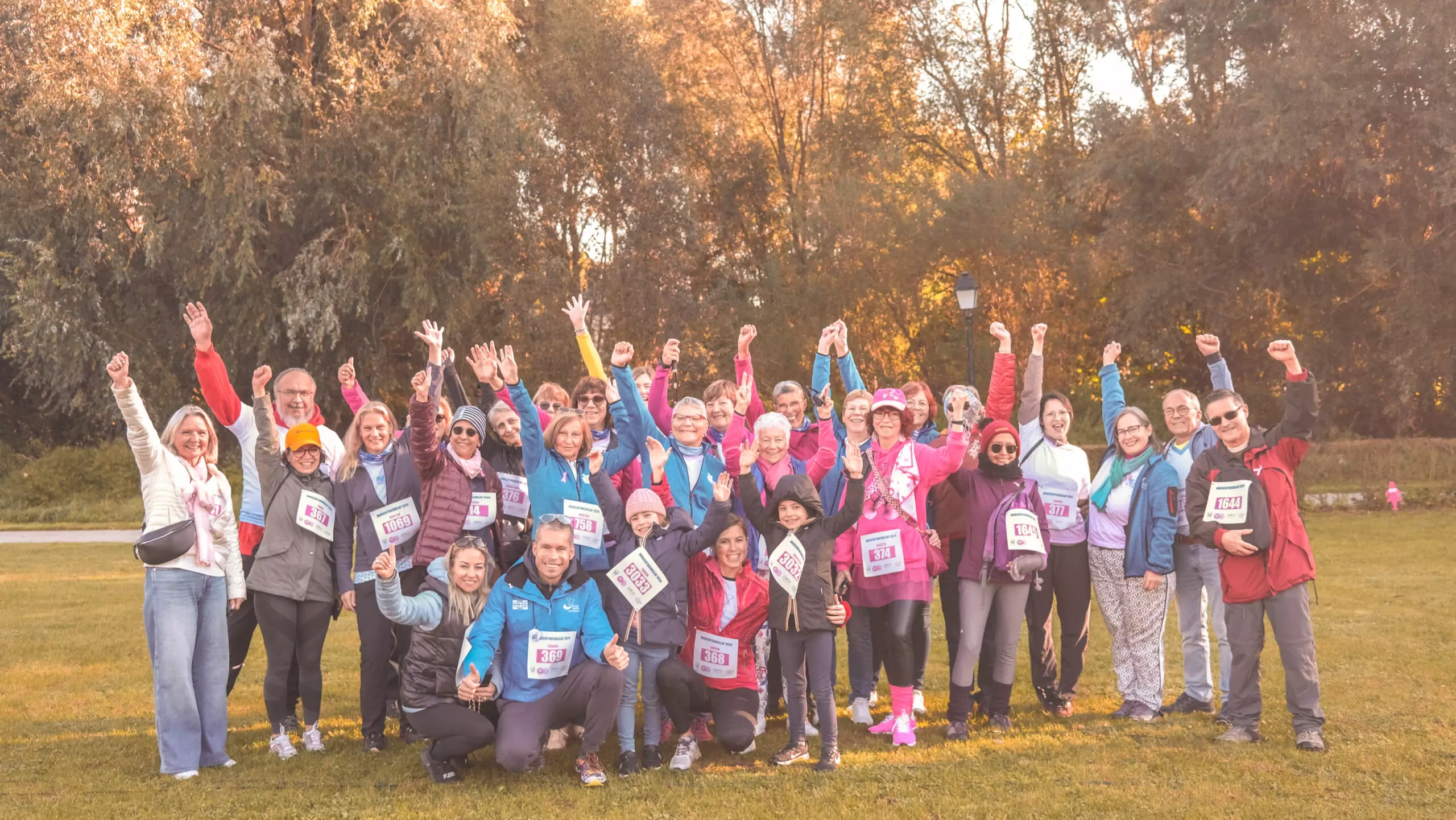 a group of ALGSO members posing for a photo with their fists raised in unity. a group of ALGSO members posing for a photo with their fists raised in unity.