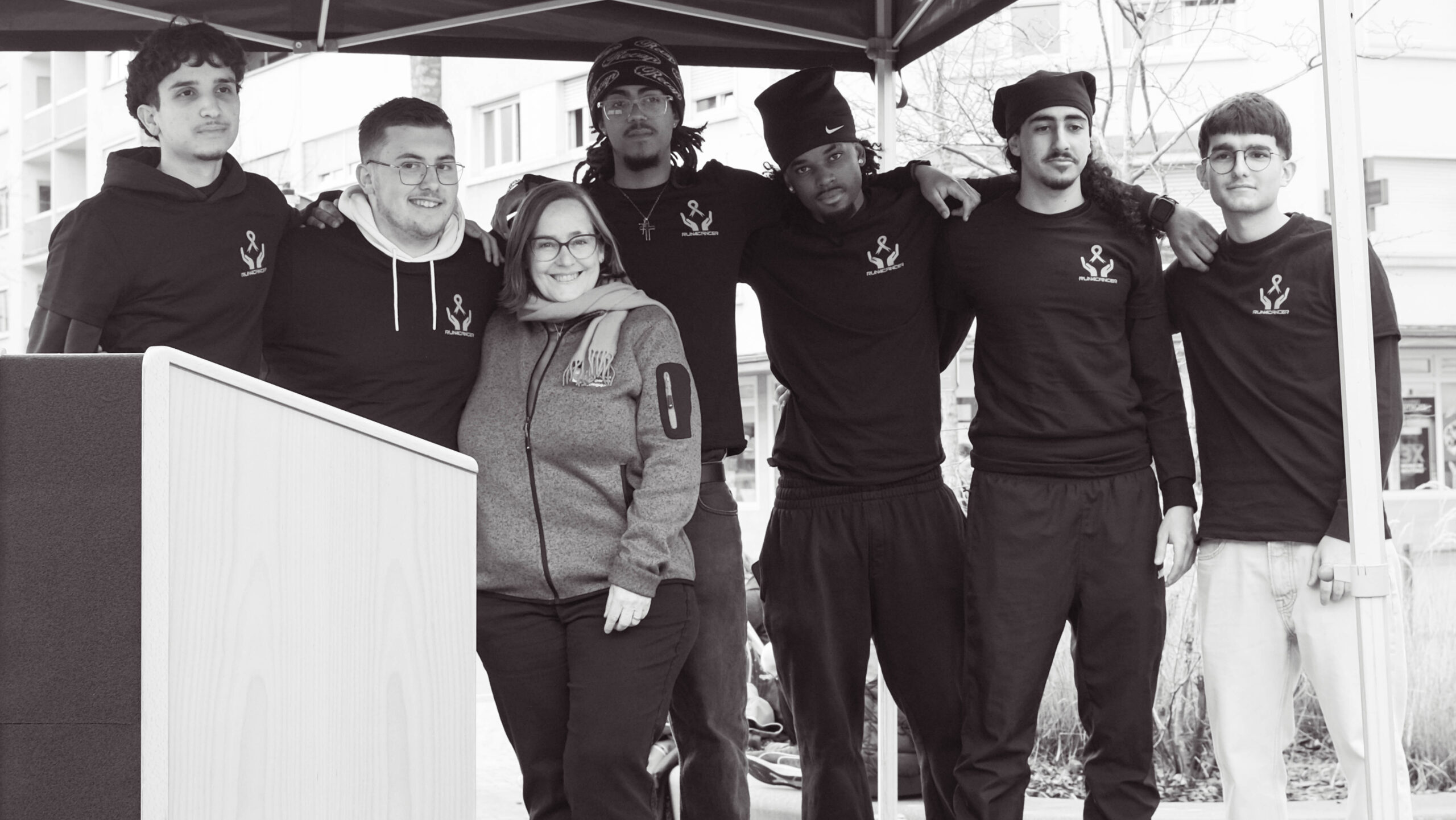 The students who organised Run4Cancer 2024 posing with an ALGSO member