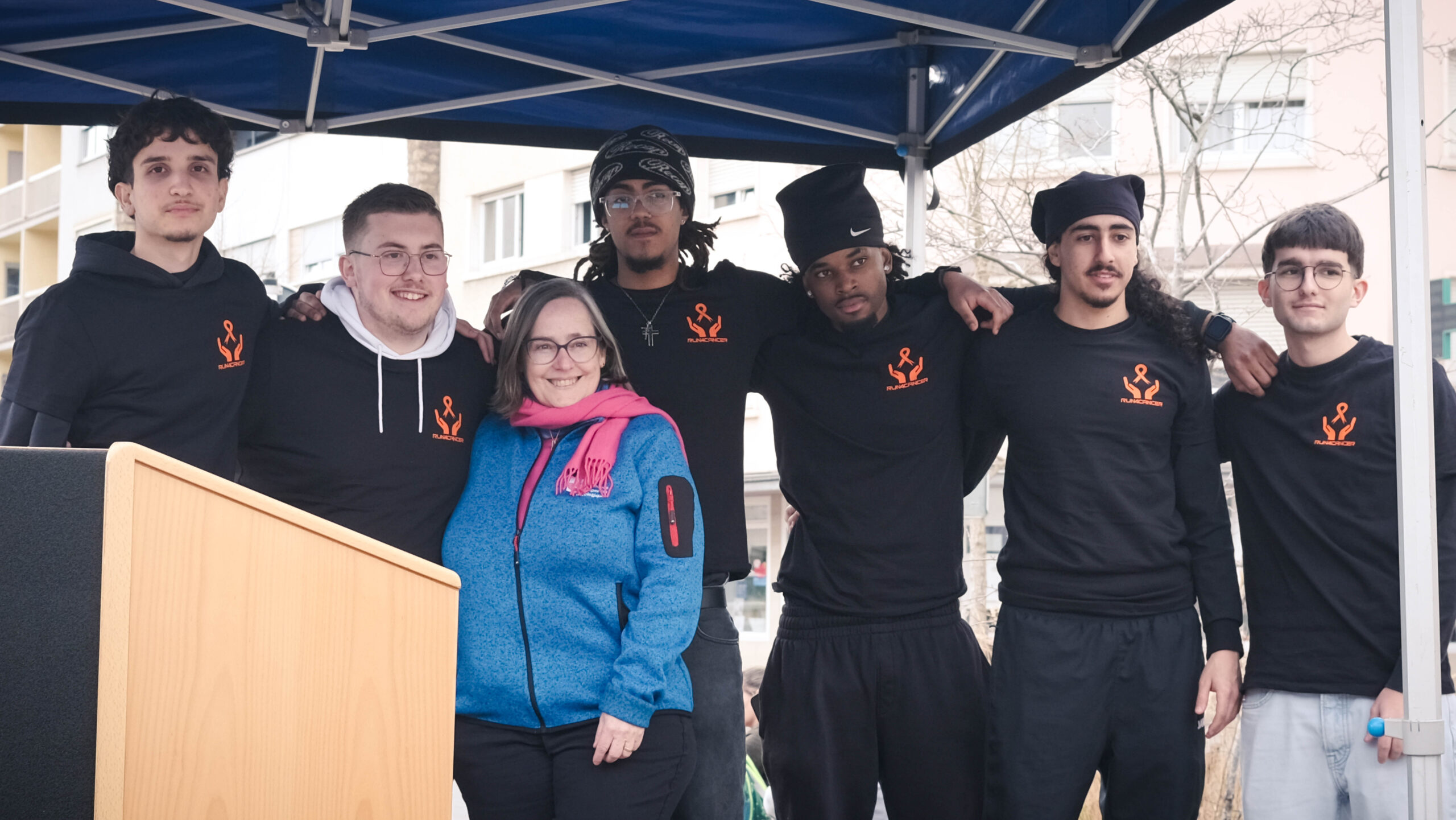 The students who organised Run4Cancer 2024 posing with an ALGSO member