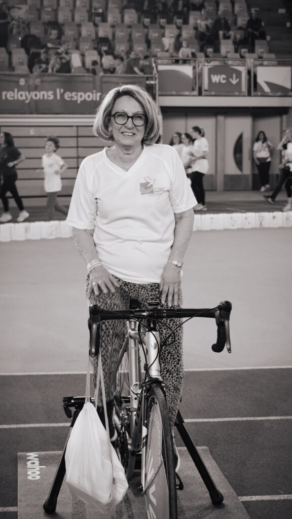 An ALGSO member on a bicycle at the Relais pour la Vie 2025 Luxembourg
