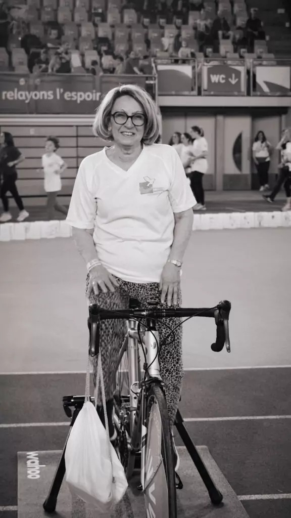 An ALGSO member on a bicycle at the Relais pour la Vie 2025 Luxembourg